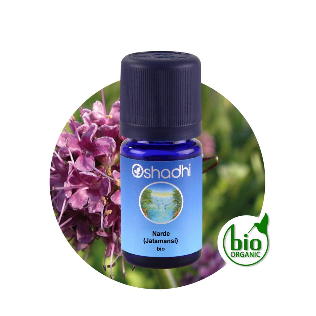 Nardenöl mit Blüten im Hintergrund und Bio Zertifizierung